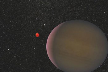 Artist’s impression of the planet, believed to be 1.5 times larger than Jupiter, orbiting its tiny parent star, a red dwarf. The distance between the star and planet is three times the distance between Earth and the Sun. (Credit: NASA)