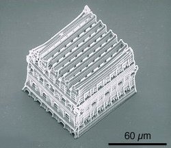 Microstructures of interest in photonics and sensing, such as the stack-of-logs photonic crystal can be created using the two-photon absorbing molecules (Credit: JW Perry, U Arizona)