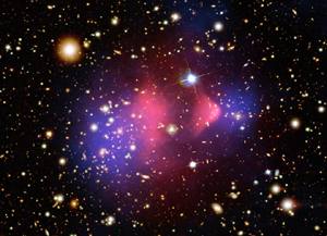 The galactic bullet cluster formed as two large galactic clusters merged in the most energetic known event since the Big Bang (Credit: NASA)