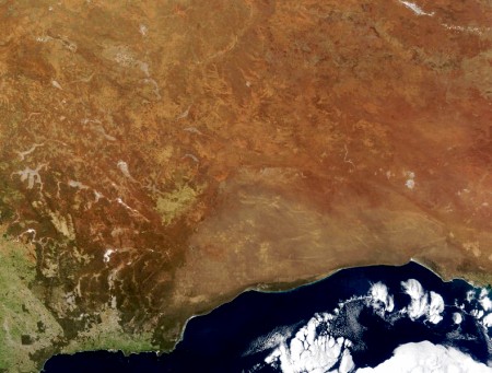 Australia’s Nullarbor Plain visible as the smooth croissant shaped coastal region in this NASA satellite image (Credit Jacques Descloitres, MODIS Rapid Response Team, NASA/GSFC)
