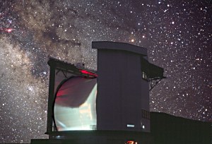 The silvery dome of the James Clerk Maxwell Telescope looks out on Tau Ceti, showing how life could take a hammering on a distant world. (Credit: Nik Szymanek)